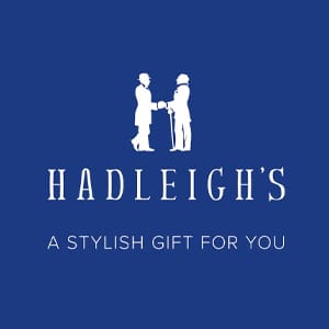 White silhouettes of two people shaking hands above the text 